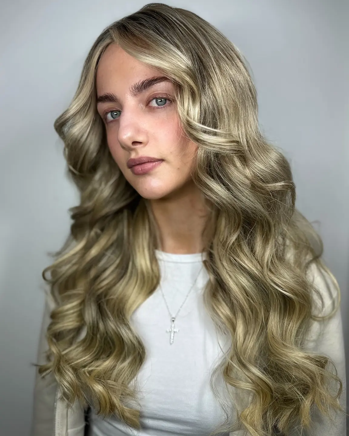 Blonde wavy hair extension portrait